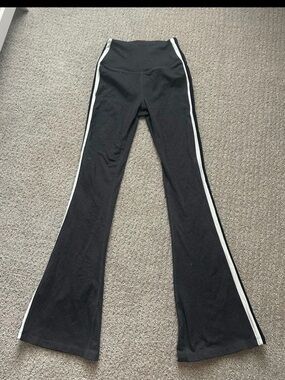 Grey splits 59 flares with black and white lines on the side size XS